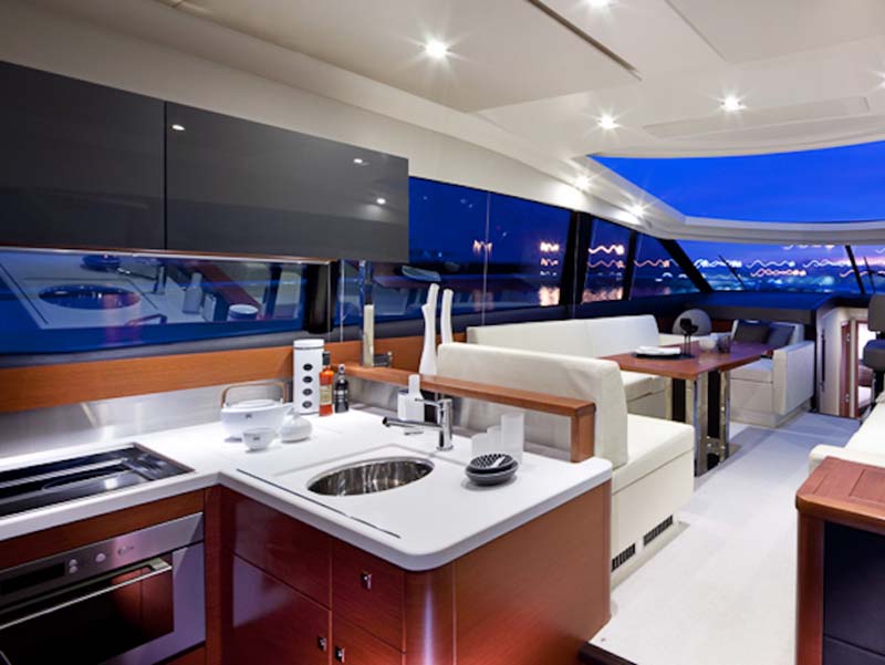 Prestige 500S salon at night with sunroof open