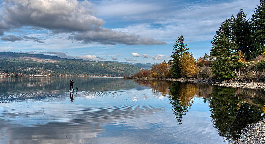 Paddleboarder enjoying calm water above Bonneville Dam on the Columbia River