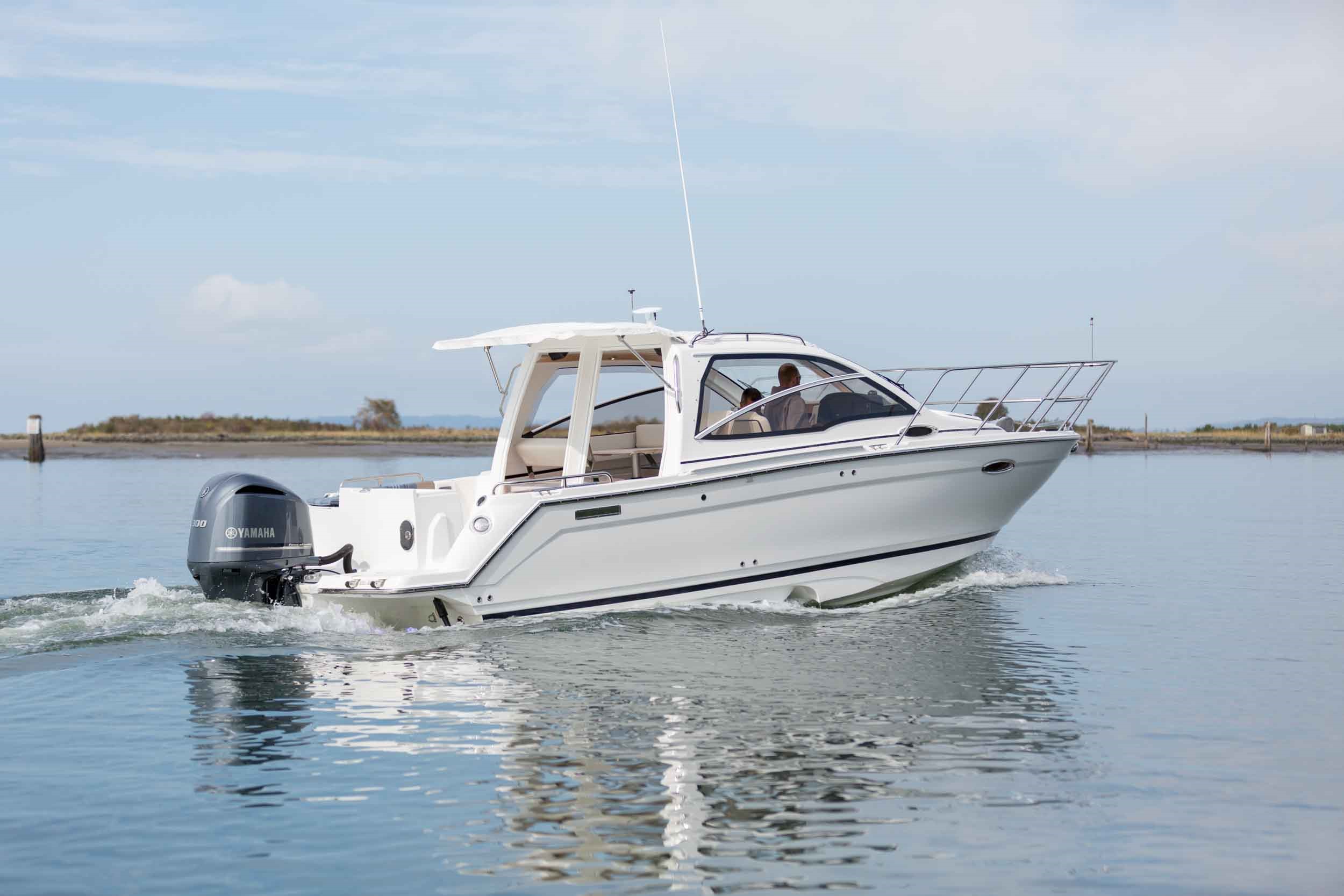 Cutwater C-242 Sport Coupe cruising about 10 knots