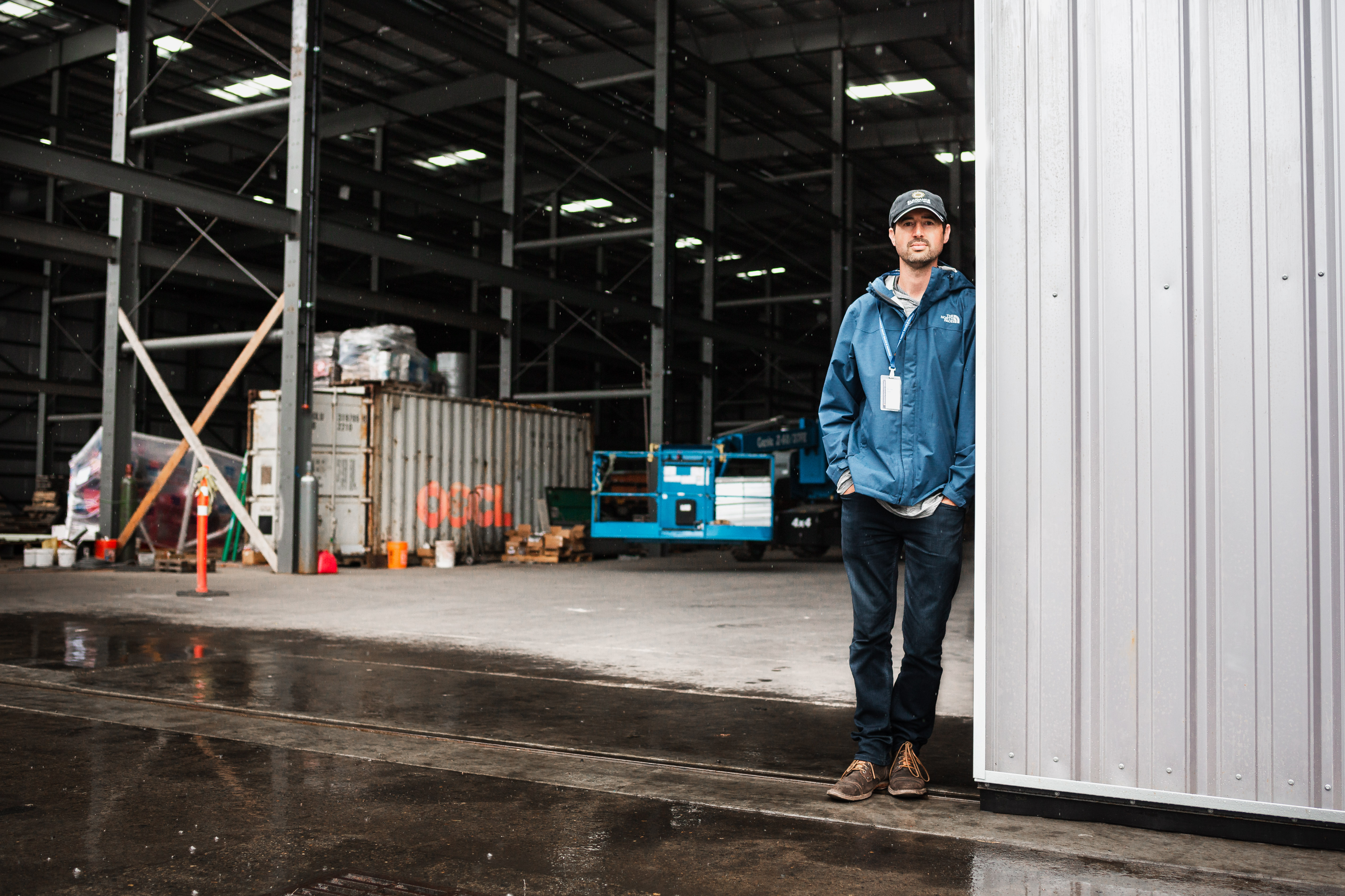 Brian Buck standing at door of Sundance Dry Storage, under construction