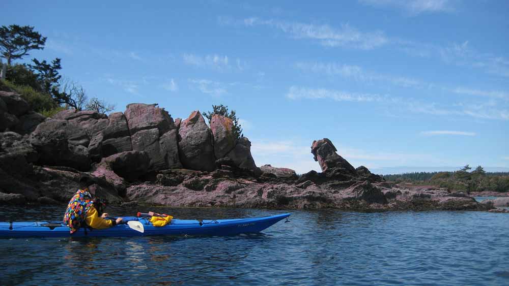 Blue kayak in the waters around Sucia Island