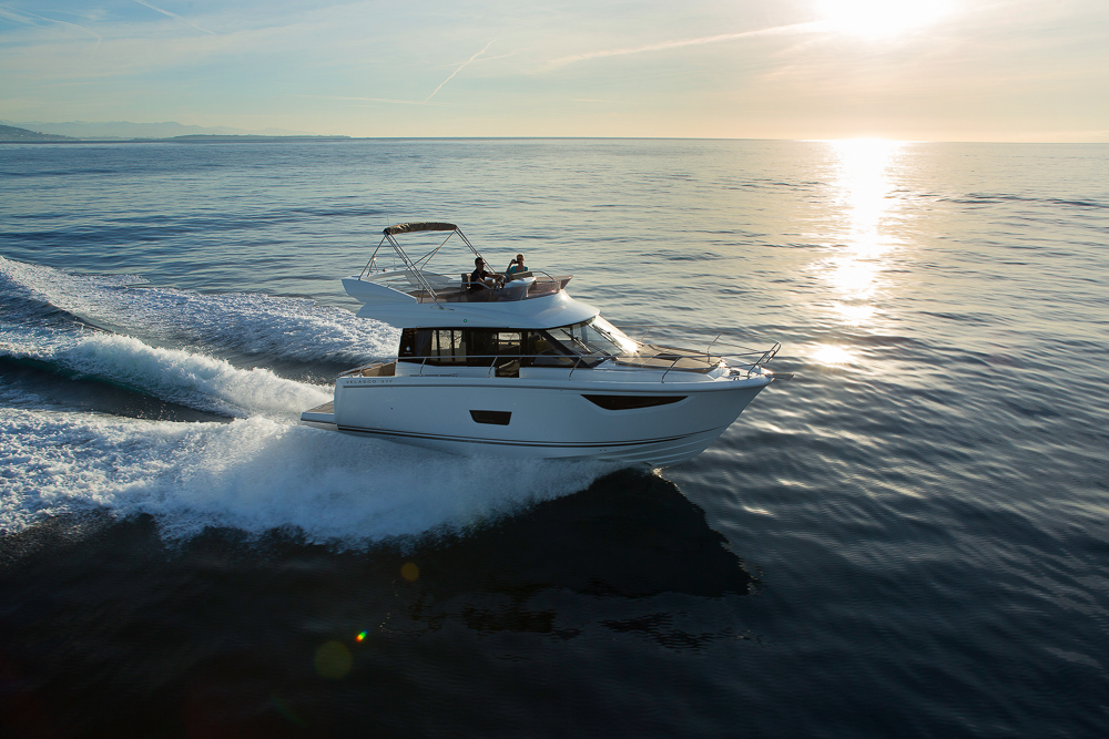 Photo of Jeanneau Velasco 37F cruising at sunset