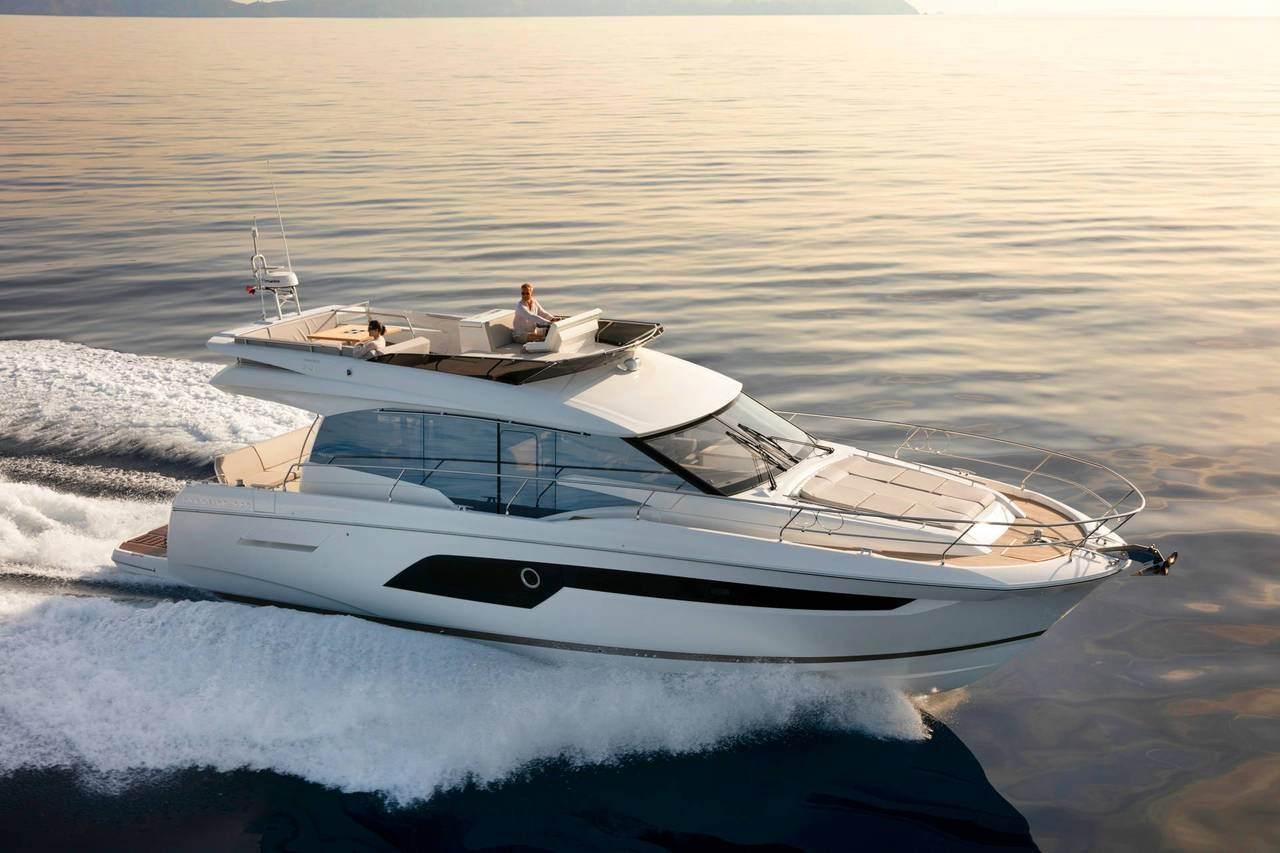 Prestige Yachts 520 running in open water with low angle sunlight