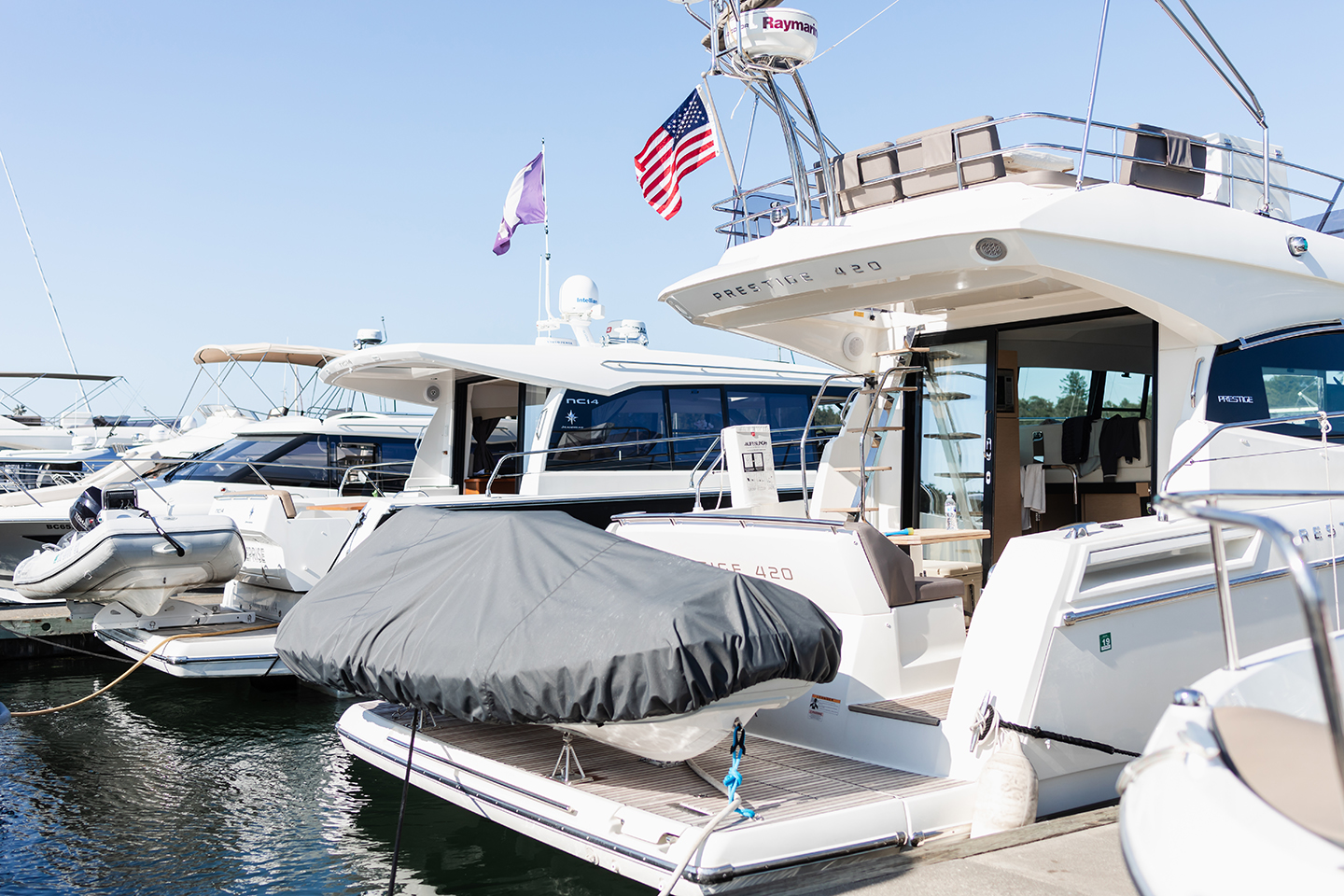 Prestige 420 and Jeanneau NC 11 tied up at the dock