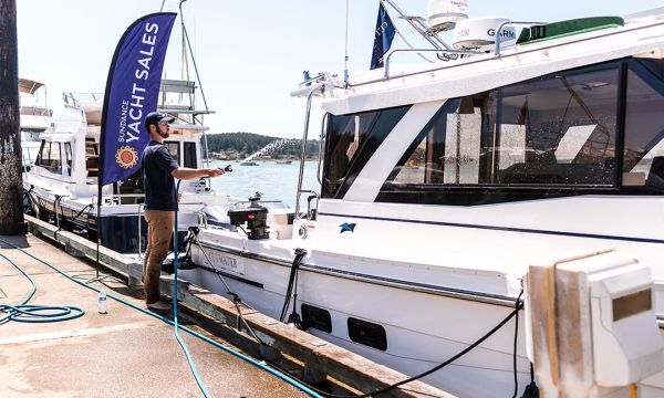 Sundance employee washing 30' Cutwater