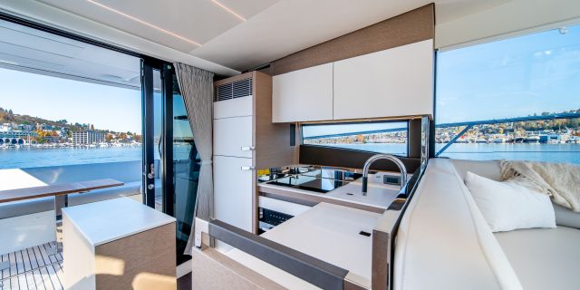 Photo of the Prestige 520 galley open to cockpit 