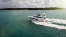 Prestige 460 photo of the boat running at speed in open water