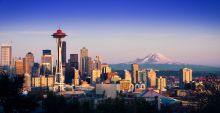 Photo of Seattle, WA city skyline with Space Needle and Mt. Rainier