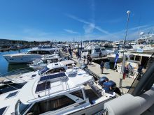 Lots of boats on display in Cap Sante Marina in Anacortes, WA on a sunny day